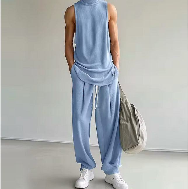 Découvrez l'Ensemble Deep, set deux pièces débardeur et pantalon. Style minimaliste et confortable. Disponible en beige, bleu ciel, vert clair et gris clair. Livraison rapide.